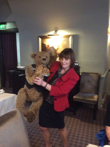 Jane Tizard and the mascot for the Macdonald Bear Hotel