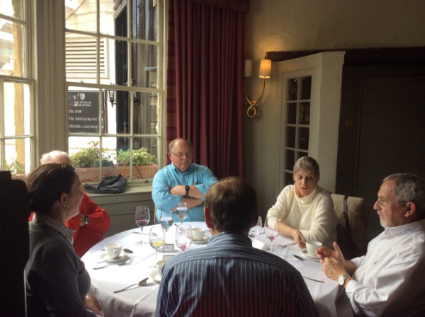 Rolf Peterson, Jessica Thompson, Carl Thompson, Russ Tait, Lee Anderson and Al Reiner enjoy lunch in a sunny window at the Macdonald Bear Hotel